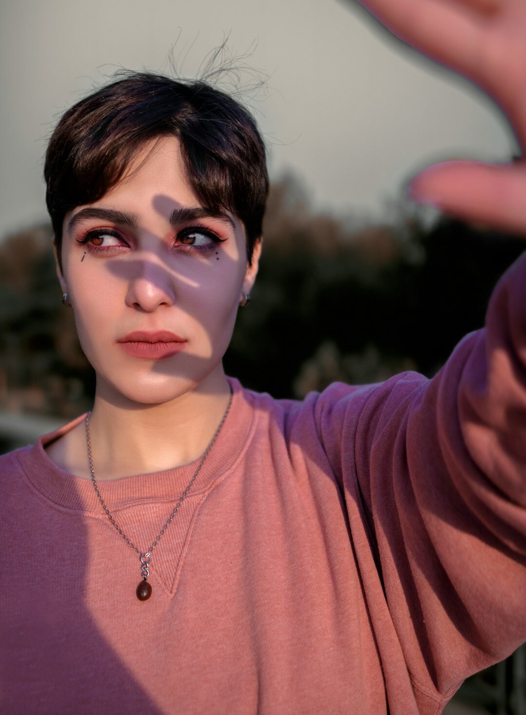Portrait of a woman video editor with short brown hair
